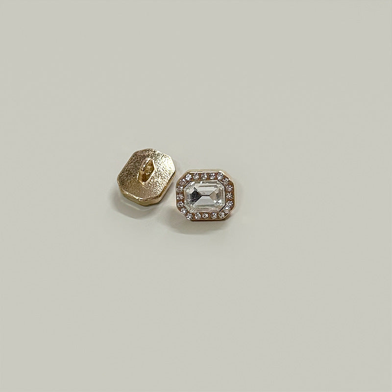 Square 12mm button with clear/white gemstone center and crystal border on gold-tone base