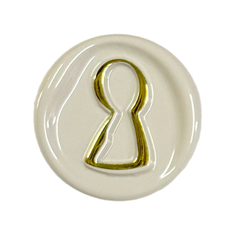 23mm round metal button, white with golden-lined miniature figure and shank