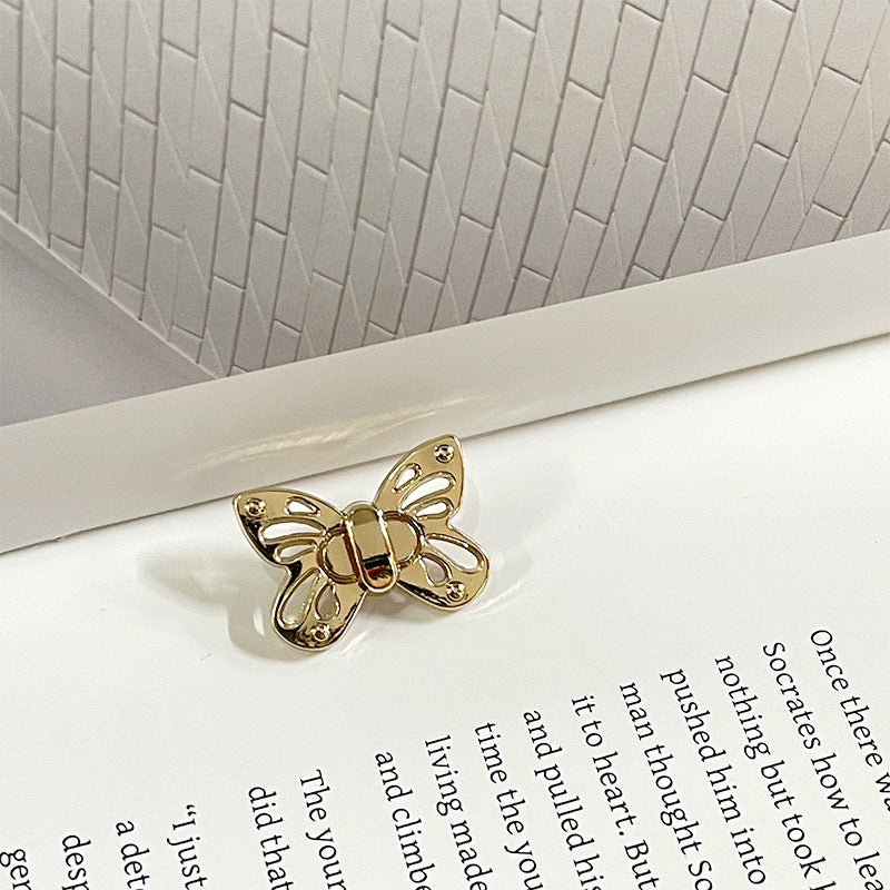 23mm butterfly metal sewing button, gold with central gem detail