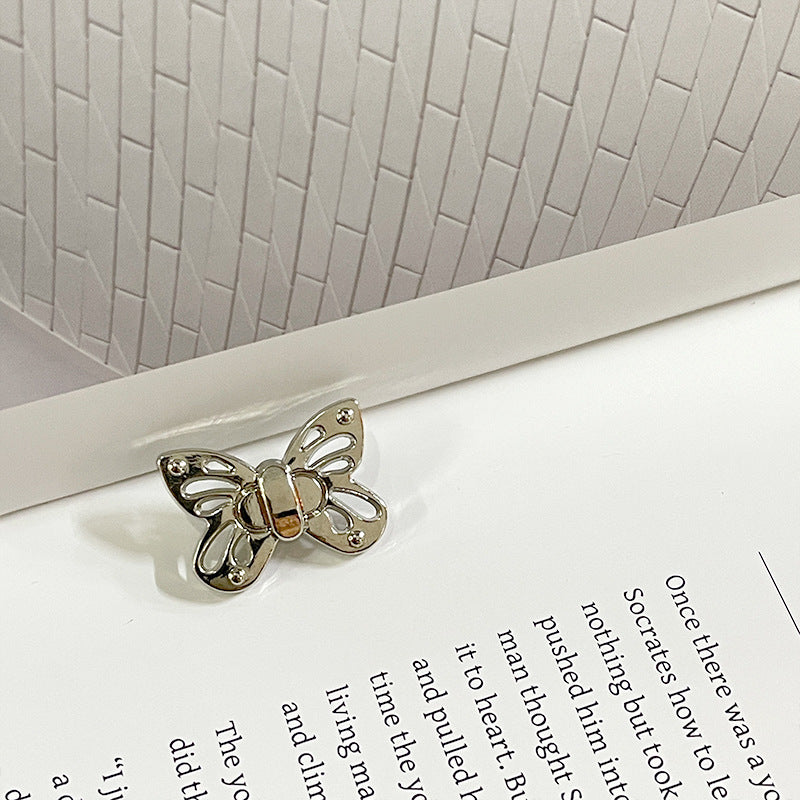 23mm butterfly metal sewing button, silver finish with central gem detail