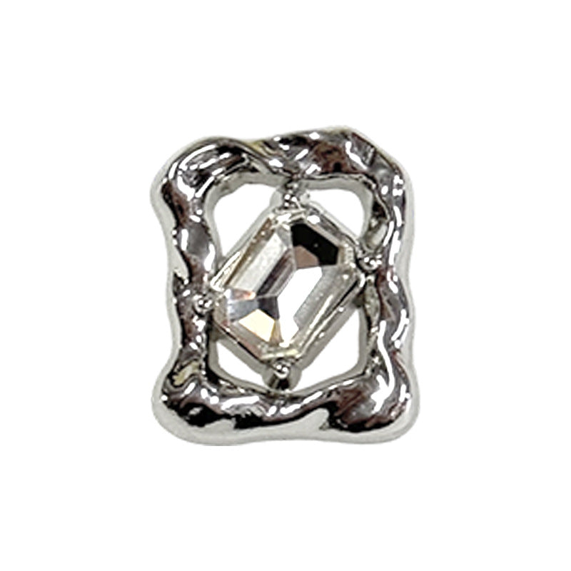 Silver rhinestone button with clear faceted center and ornate metal frame