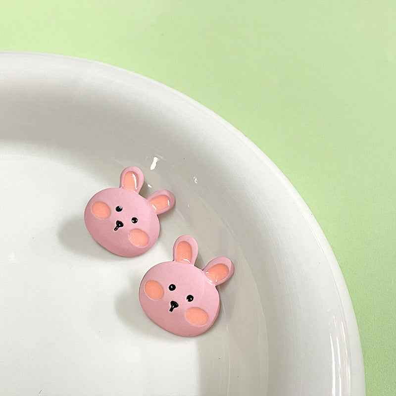 Pink cartoon rabbit metal buttons 16x18mm with shanks, two buttons visible