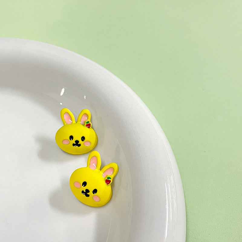 Yellow cartoon rabbit metal buttons with shanks (12-pack), two shown