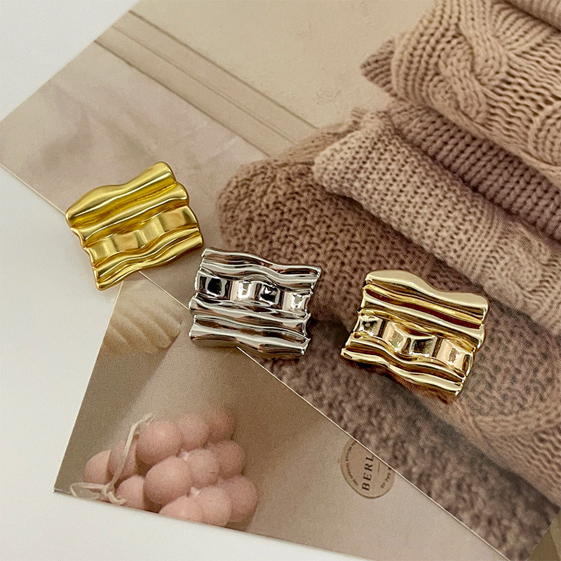 Wave grid metal buttons in gold and silver, textured irregular square design