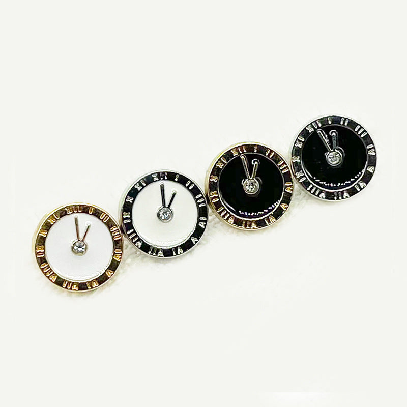 Round clock-style buttons, black and white enamel faces, gold-tone rim, set of 3