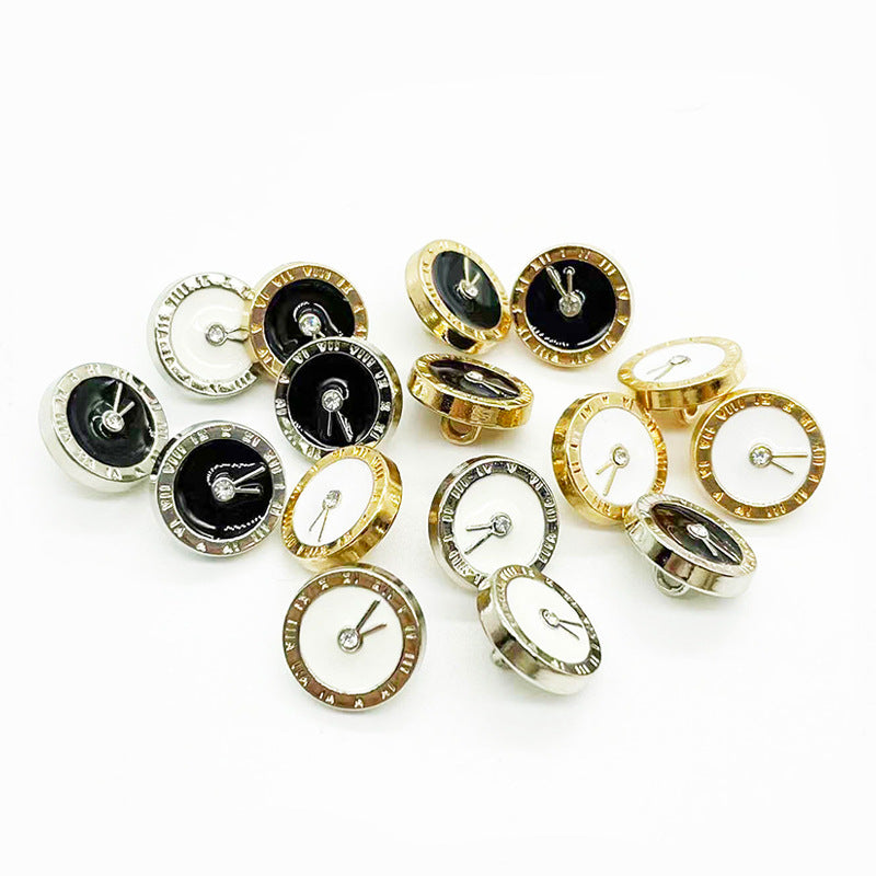 Mixed metal cuff buttons with clock faces: white and black enamel, gold and silver backs