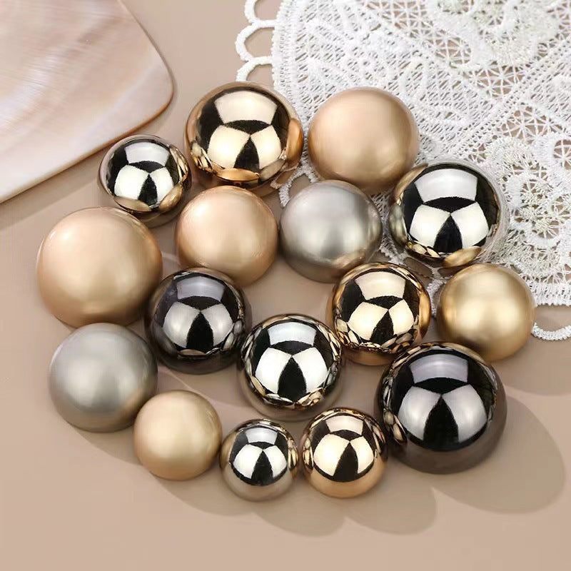 Mushroom metal buttons, shiny gold and silver with glossy black accents