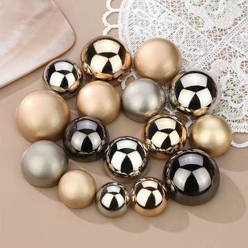 Mushroom metal buttons, shiny gold and silver with glossy black accents