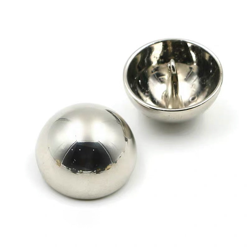 Silver mushroom buttons with glossy metallic finish, front and back