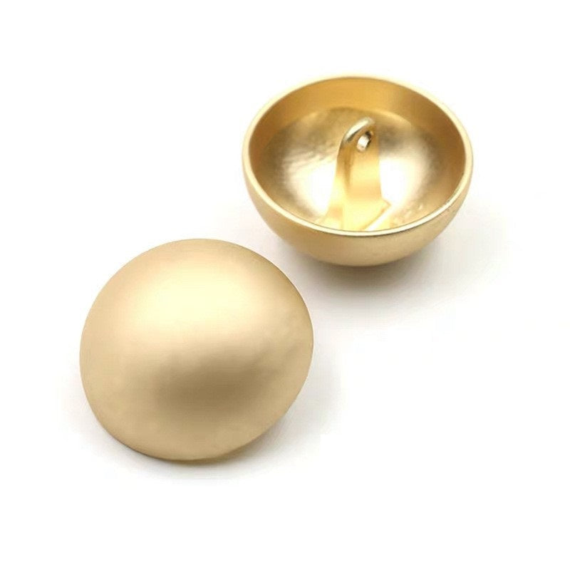 Misty gold mushroom button set: smooth glossy finish, front and underside