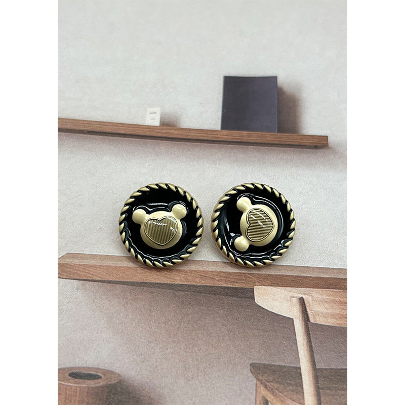 Black enamel bear-head buttons with gold metal center, scalloped round border (2 pcs)