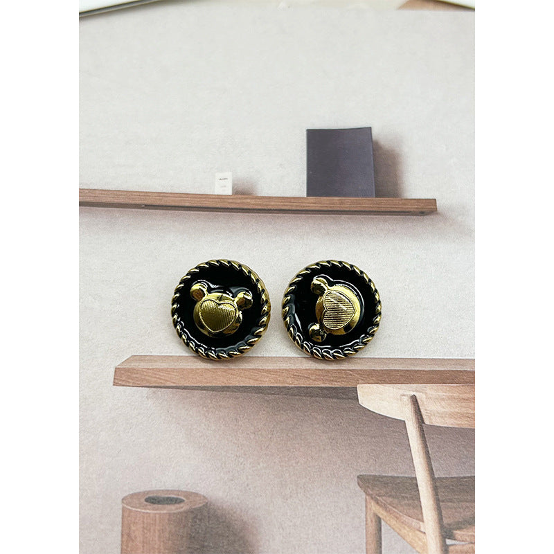Black enamel bear-head buttons with light-gold metal center, scalloped round border (2 pcs)
