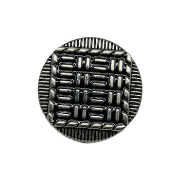 Vintage metal button: round exterior, striped pattern, silver-tone front