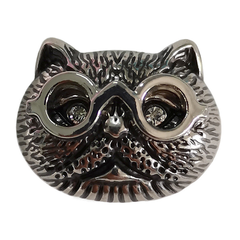 Cat-head metal sewing button, antique silver, glossy dark inlay, front detail