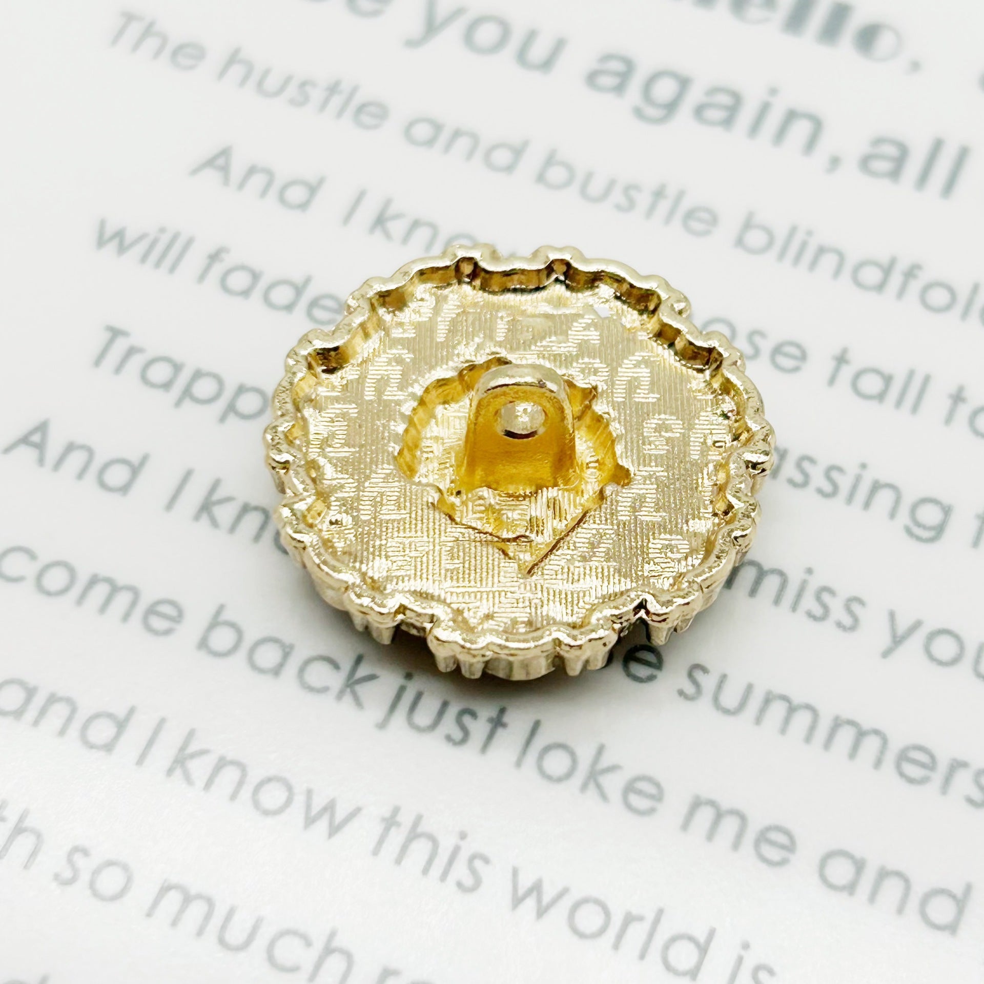 Round back of vintage flower metal button, gold finish, central shank hole