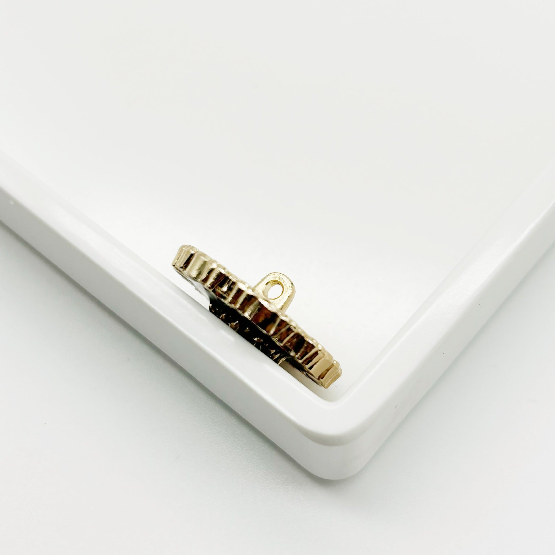 Vintage flower metal button shank, gold tone, side view