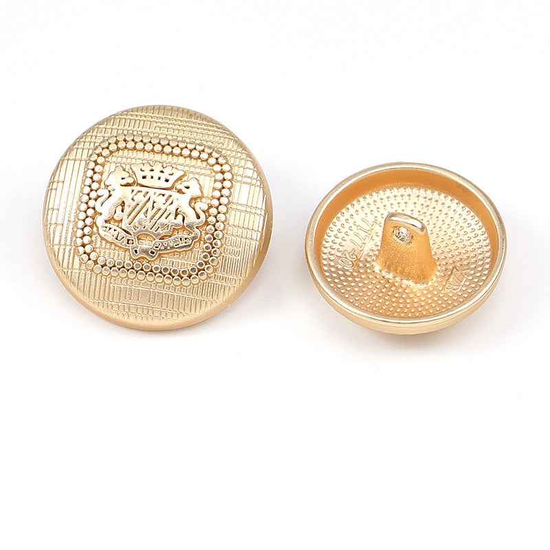 Fog gold and gold speckled round metal shank buttons with embossed crest details (2)