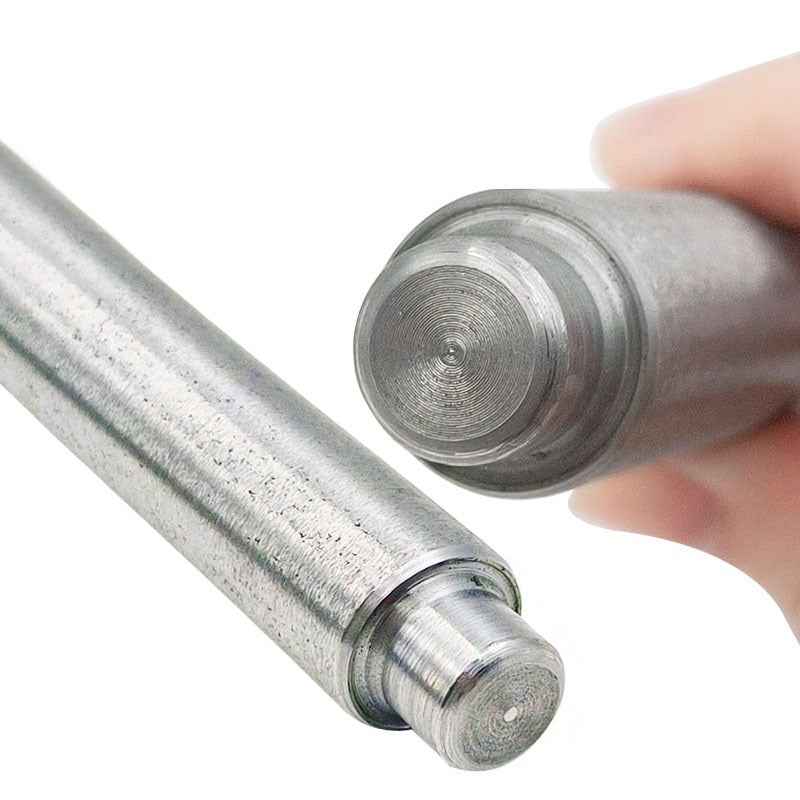 Close-up of hollow punch die for eyelets, brushed metal head with circular opening