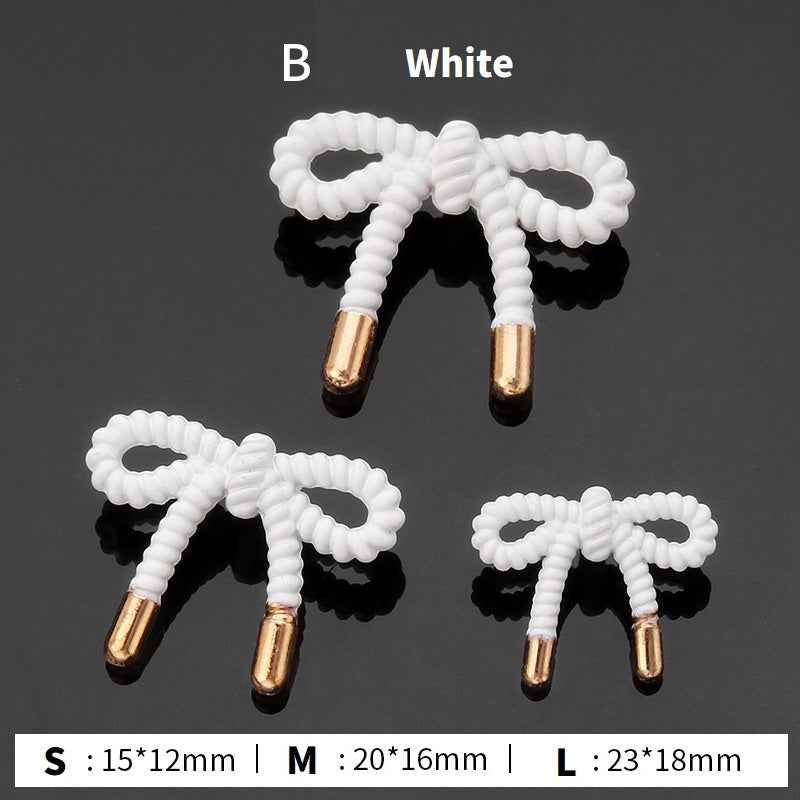 Style B stick buttons: white ribbed loops with gold stems, 3 sizes shown