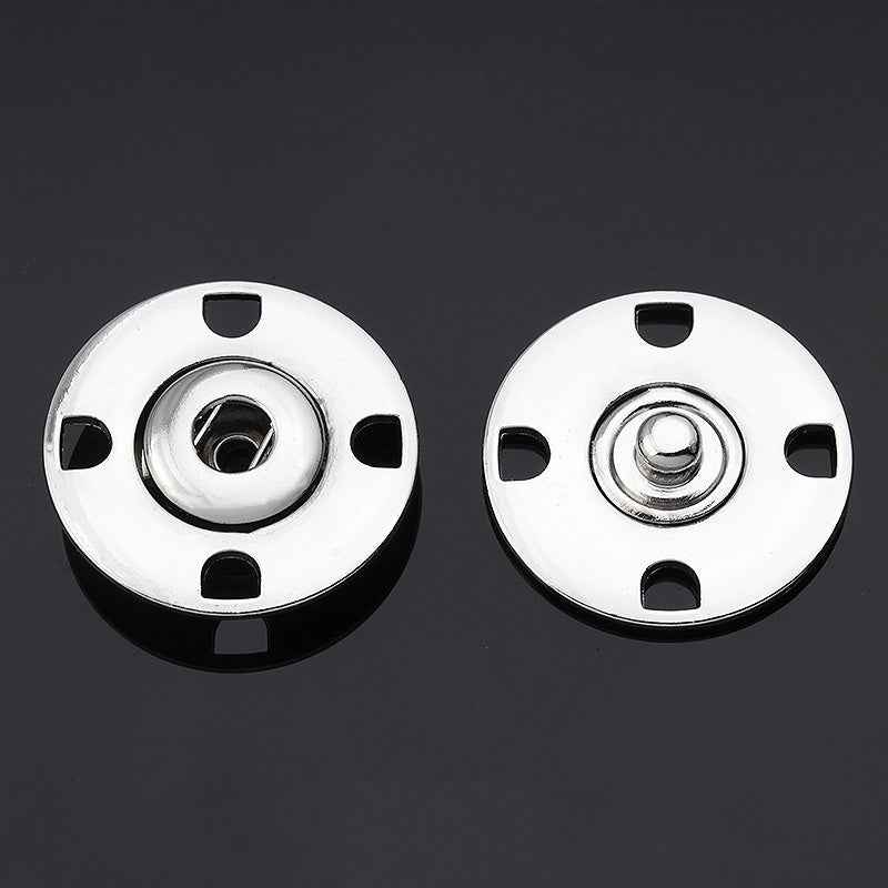 Silver metal hidden snap buttons, round disc with 4 notches and center snap posts