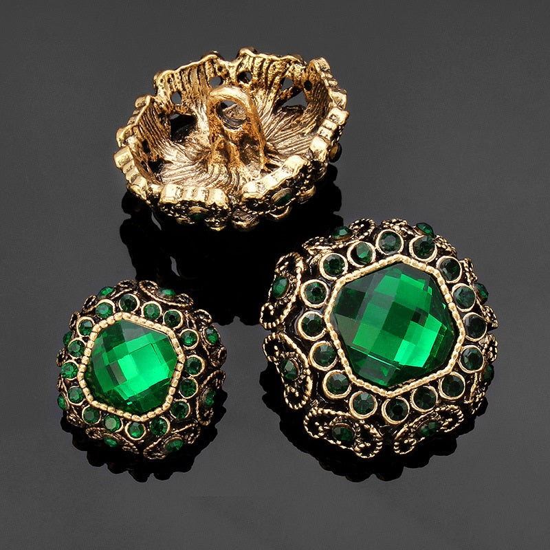 Rhinestone coat shank buttons: green faceted centers with gold-tone rhinestone border and shank backs