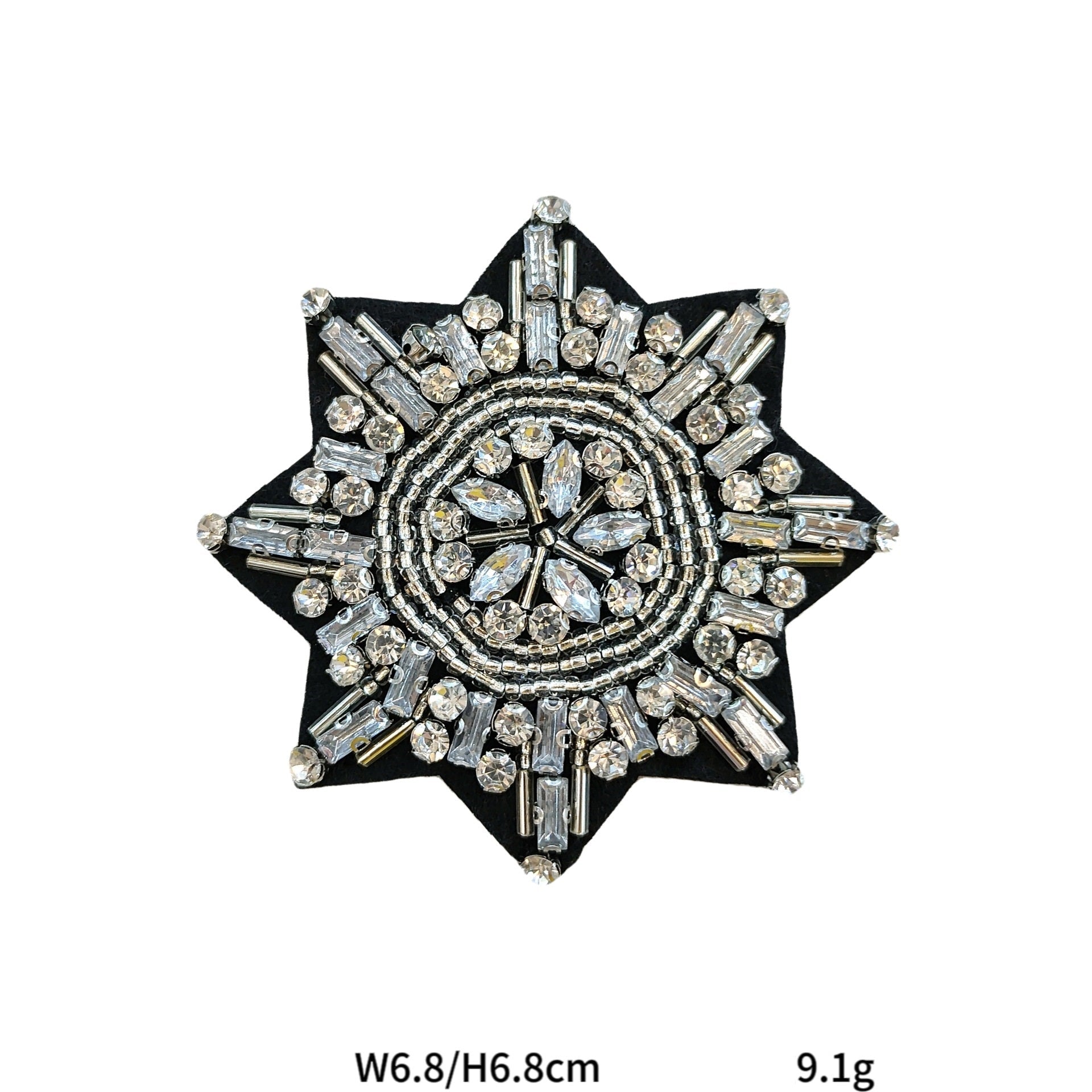 Octagonal star snowflake applique patch on black fabric with silver beaded center