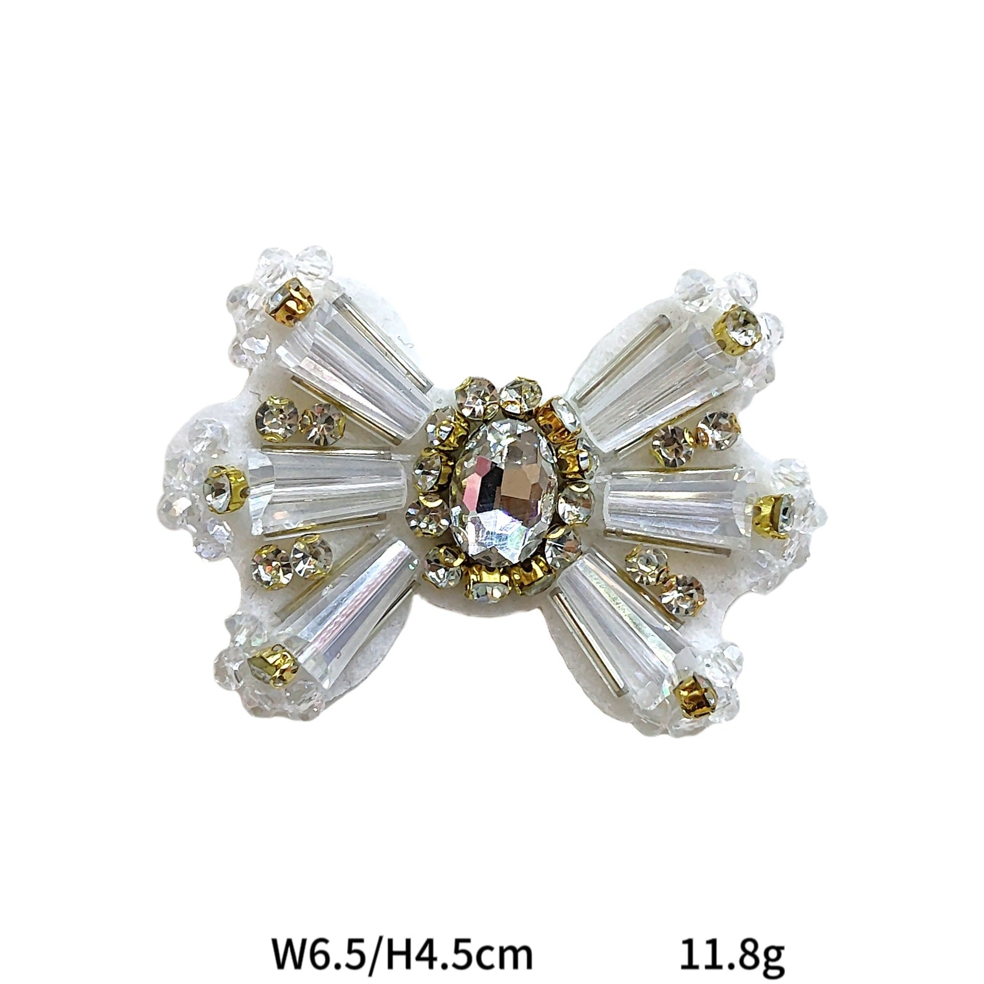 Clear rhinestone bowtie fabric patch with gold center and sparkling stones