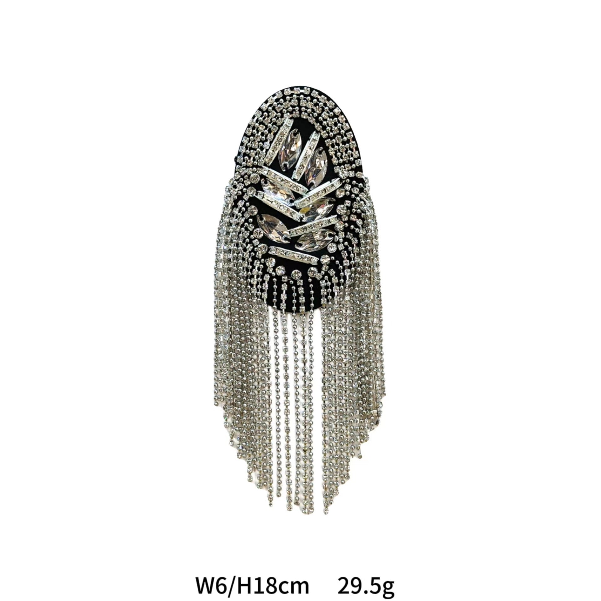 Silver crystal shoulder patch with dark top panel, rhinestone details and dangling fringe