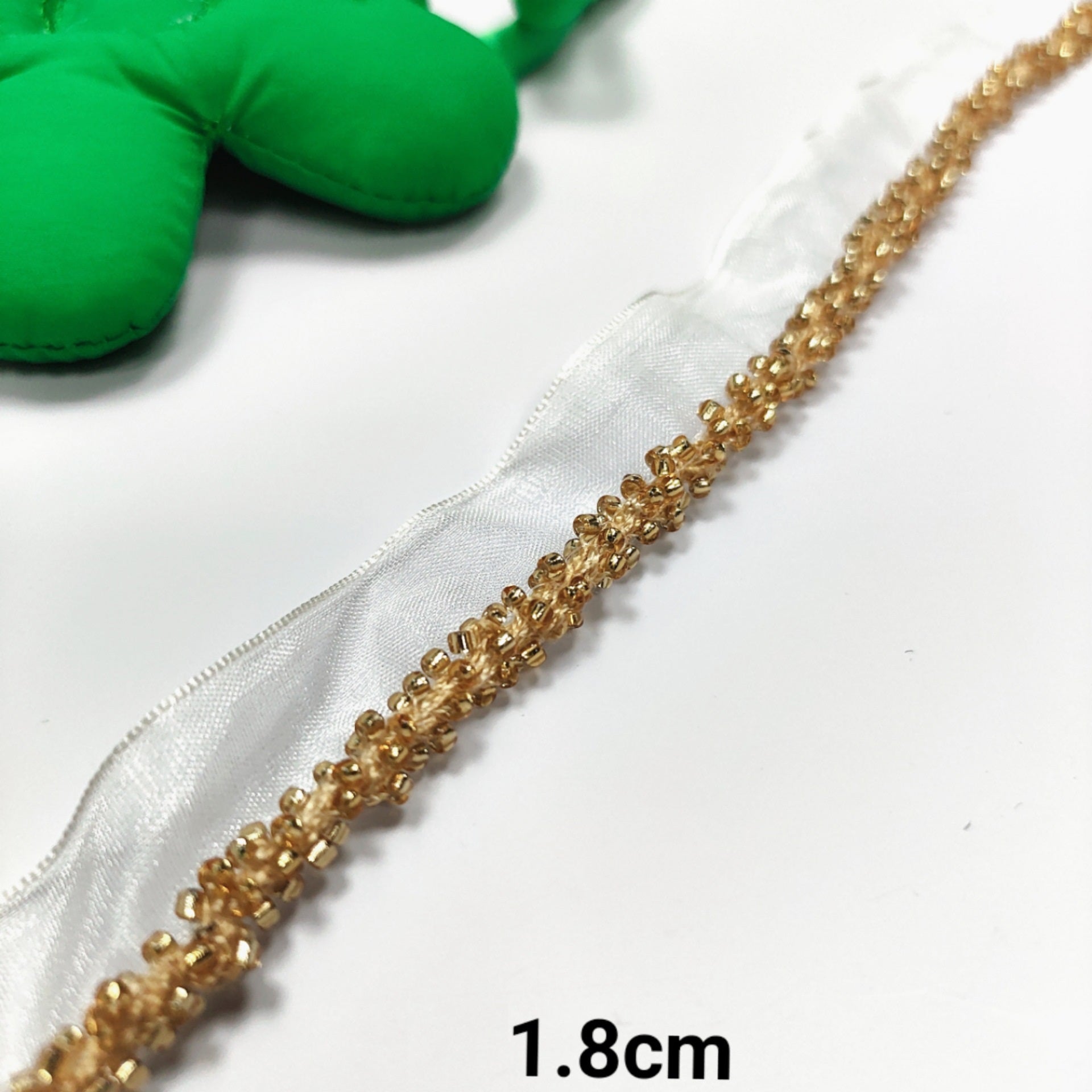 Gold crystal lace ribbon with pearl trim; 1.8cm wide