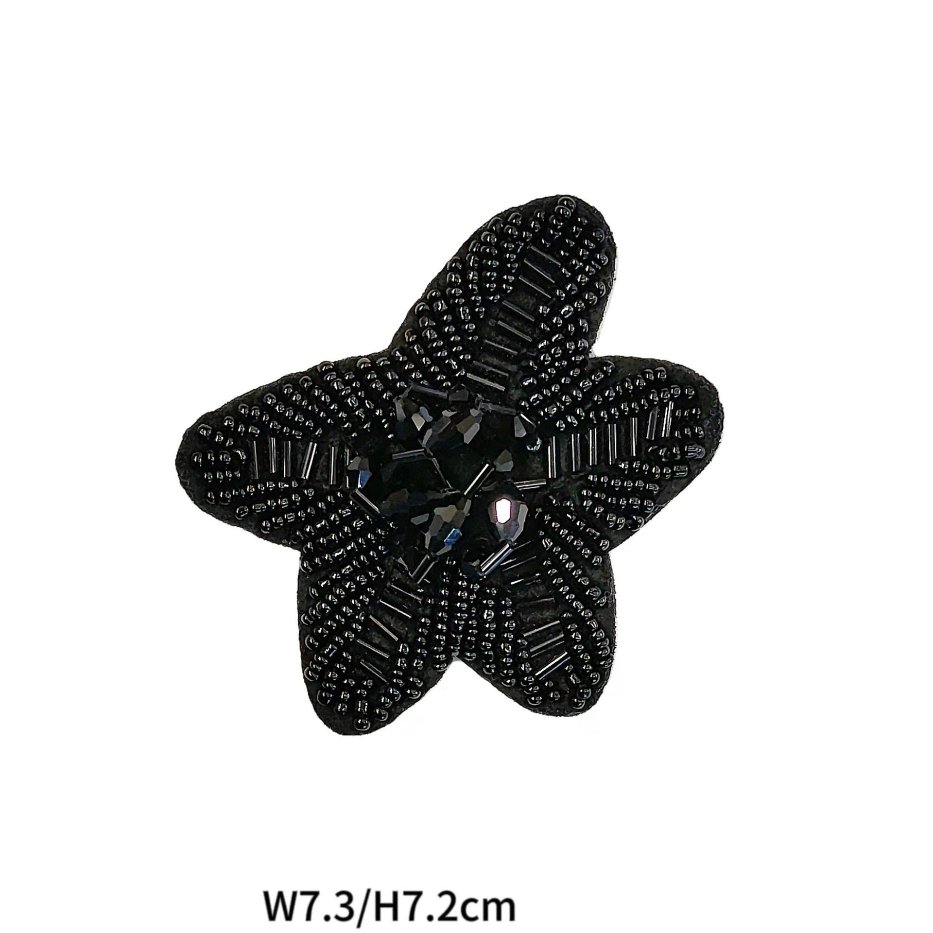 Black fabric star patch with dark rhinestones and gem center