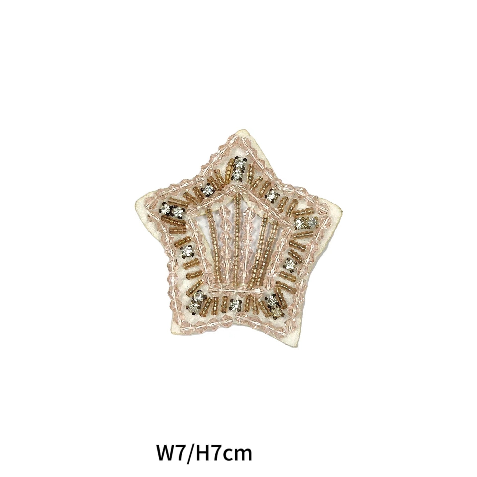 Schmuckapplikation mit ovalem Motiv, türkis, rot und goldfarbenen Strasssteinen, W8/H5.5cm