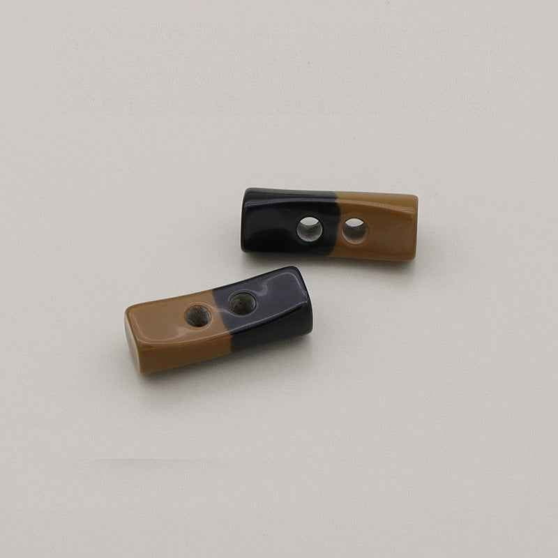 Brown and black striped resin toggle buttons, 40mm, two pieces shown