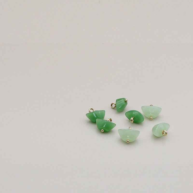 Assorted green resin shank buttons set, gold-tone metal loops