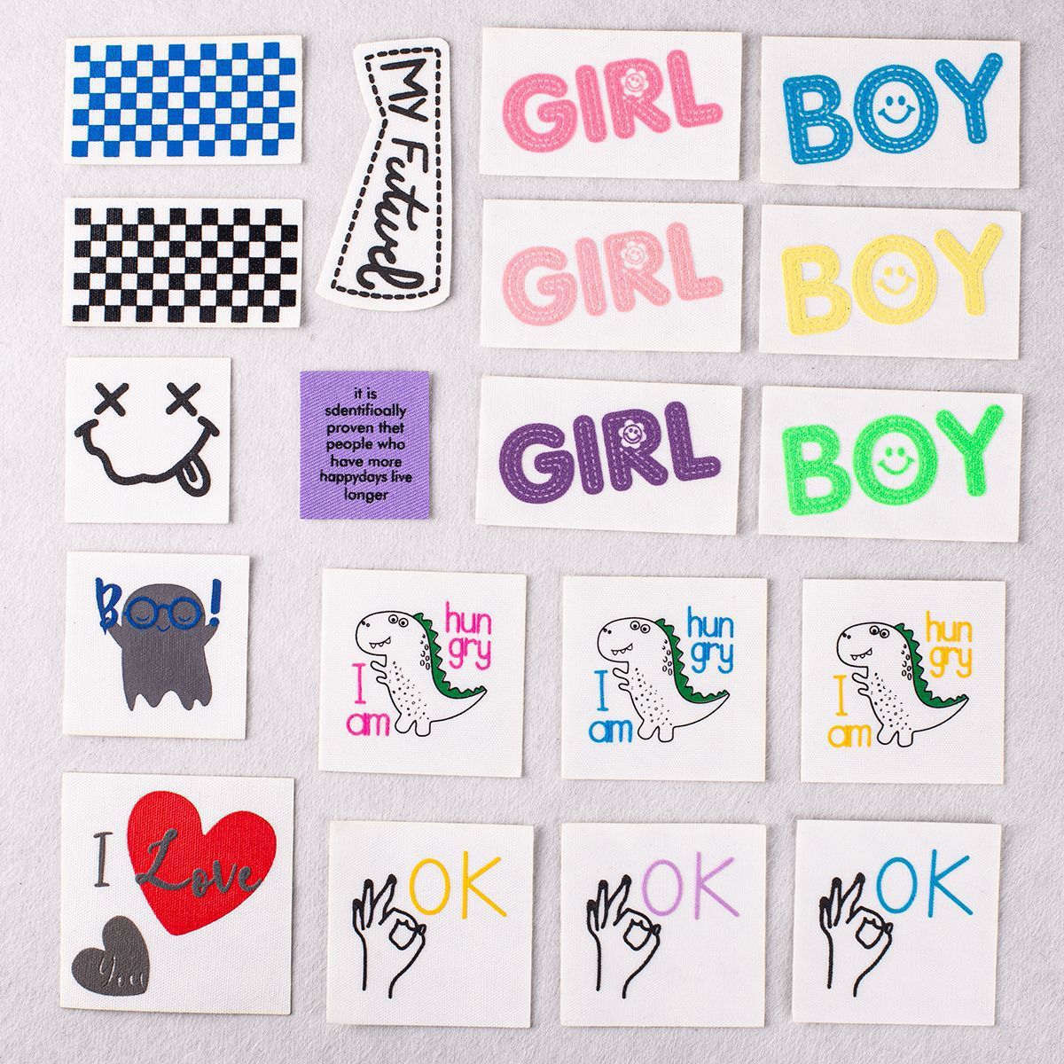 Set of iron-on patches: blue checkered, black checkered, girl boots, and boy smiles