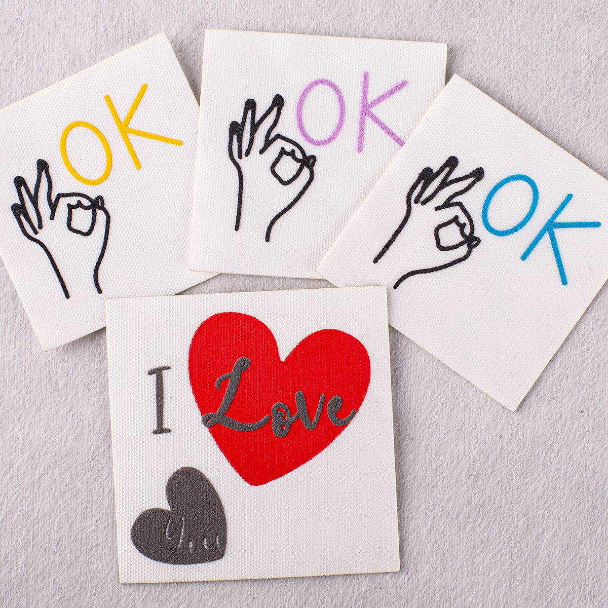Iron-on patches with OK word, hand peace sign, and I Love heart patch design