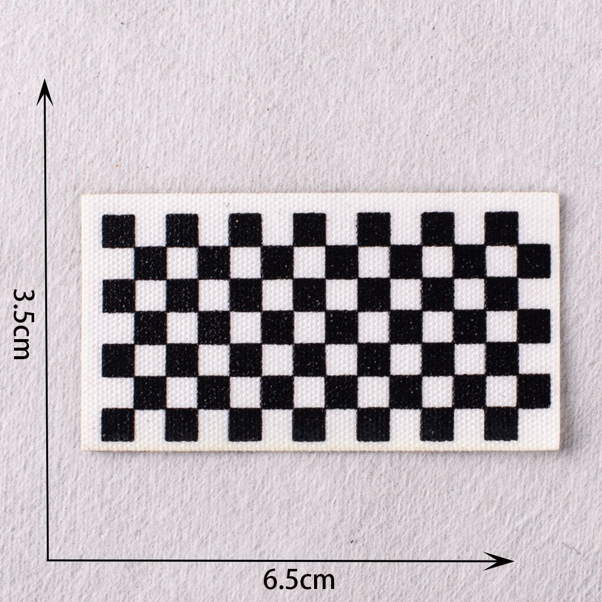 Black-and-white checkered long patch stripe design, iron-on style