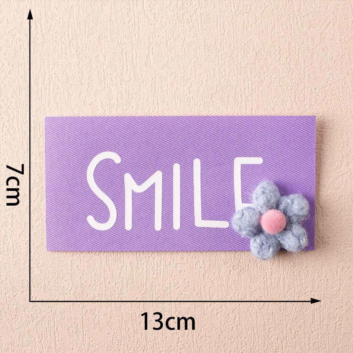 13cm SMILE badge, purple fabric with gray flower embellishment