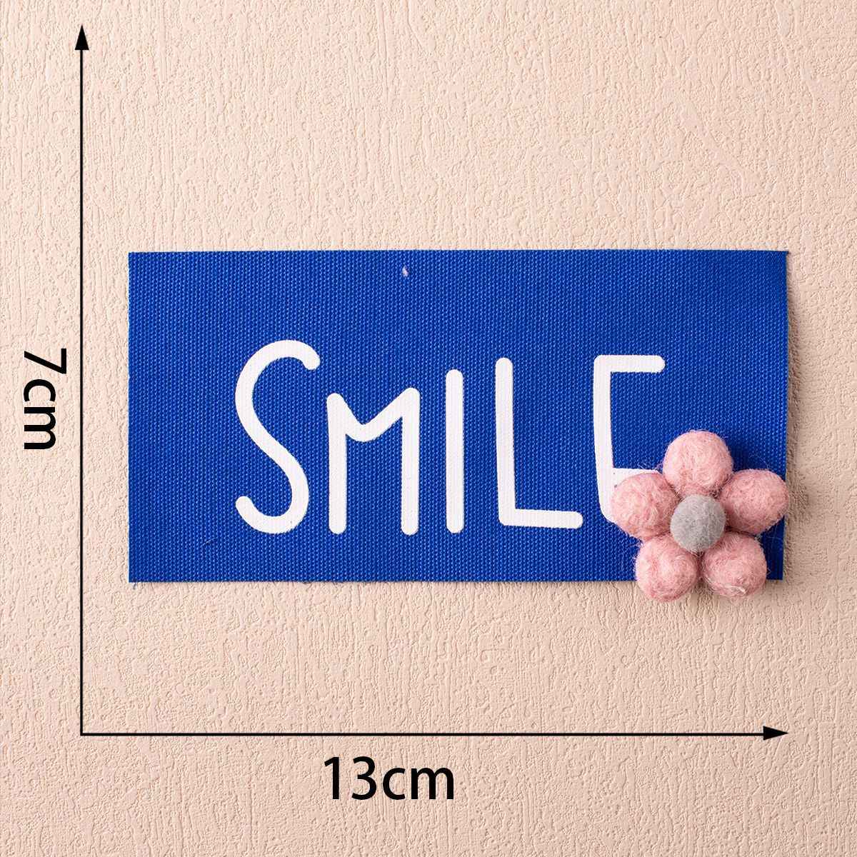 13cm SMILE badge, blue fabric with pink flower embellishment