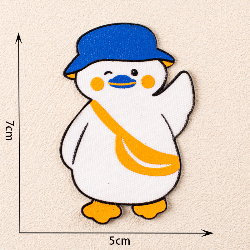 Haft-Patch Pinguin, weiß mit blauer Mütze, orange Flügel und gelben Füßen