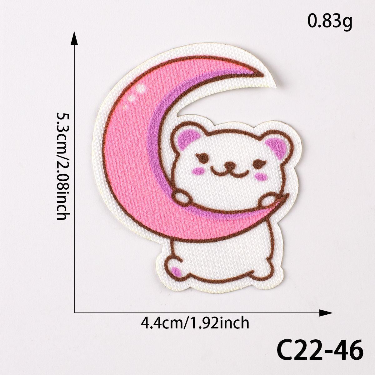 White bear self-adhesive patch sitting on a pink crescent moon