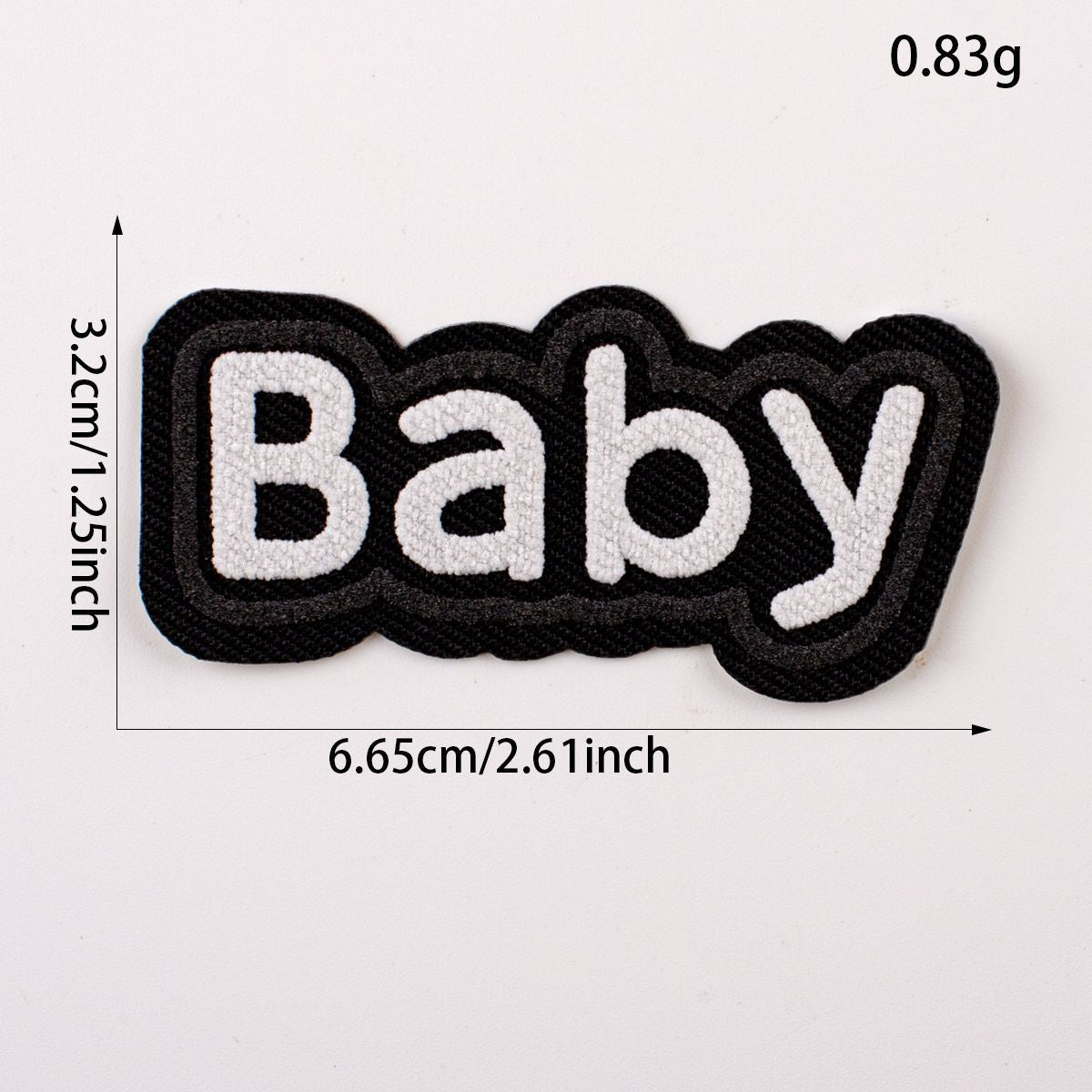 Black 3D 'Baby' letter patch with white outline, 6.65 cm x 0.83 g