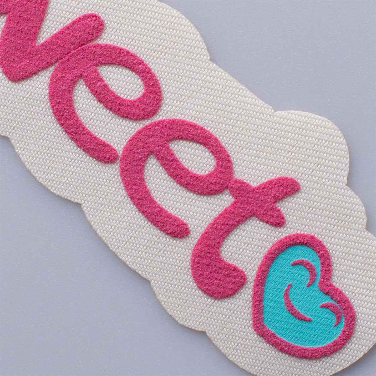 Good 3D fabric patch with pink letters and blue heart detail