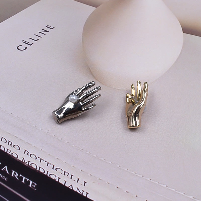 Palm-shaped pearl buttons: silver and gold hand designs with white pearl beads