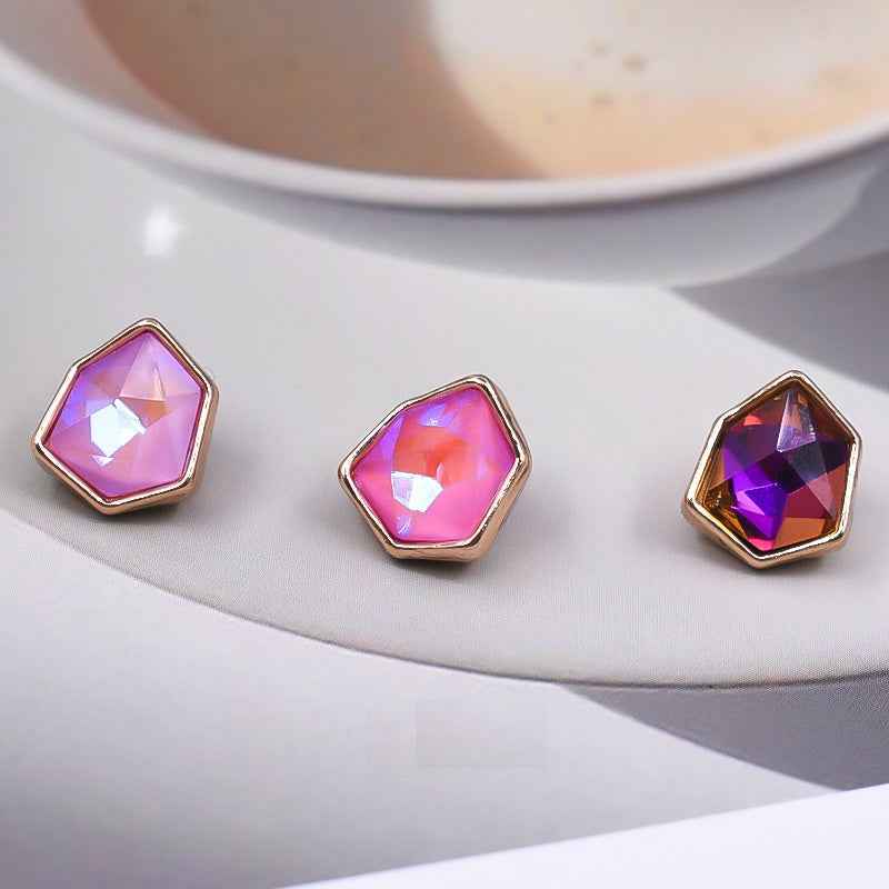 Irregular rhinestone buttons with pink and purple stones in gold-tone metal settings