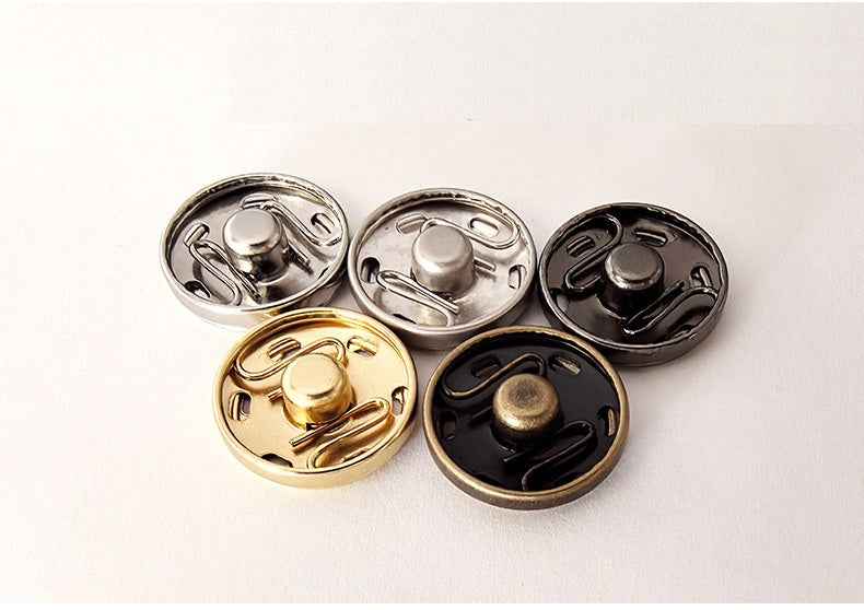 Snap buttons in brass with gold, black, and silver tones—2-piece metal fasteners