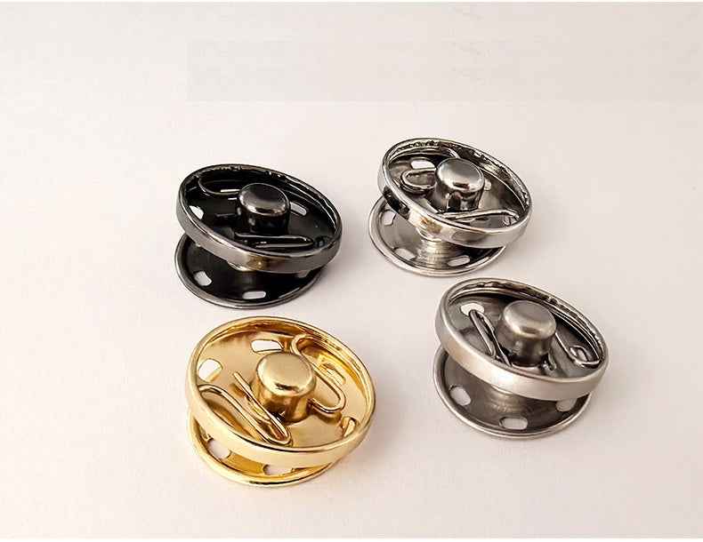 Snap buttons set: black, silver, and gold faceplates with matching metal shanks
