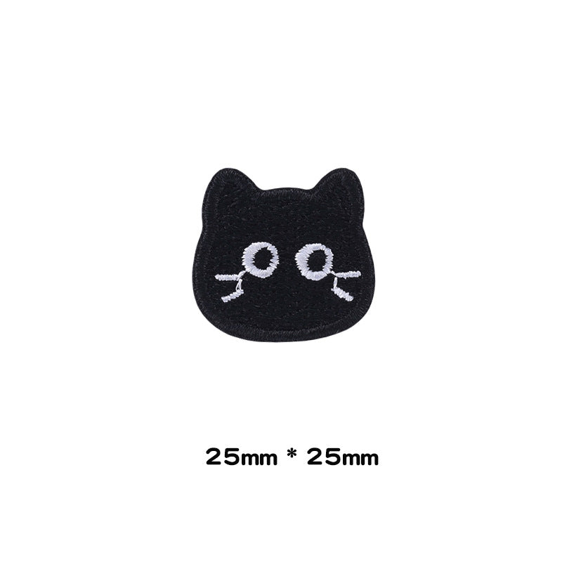 Embroidered black cat face patch, 25mm x 25mm, with white eyes and whiskers