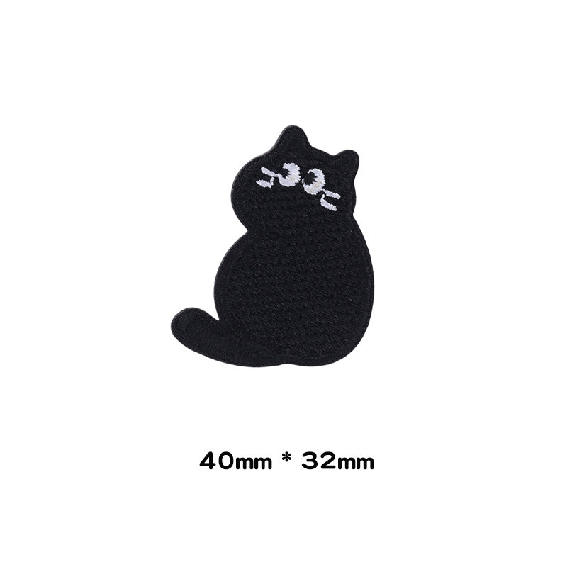 Black cat sitting patch with white eyes, 40mm x 32mm