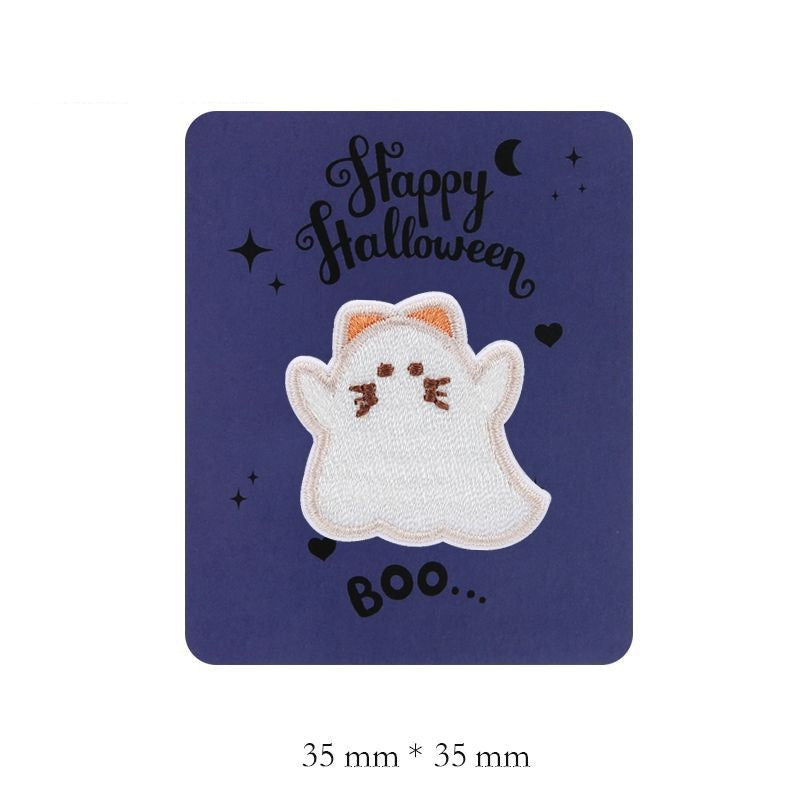 White embroidered cat ghost patch with orange-brown whiskers and ears
