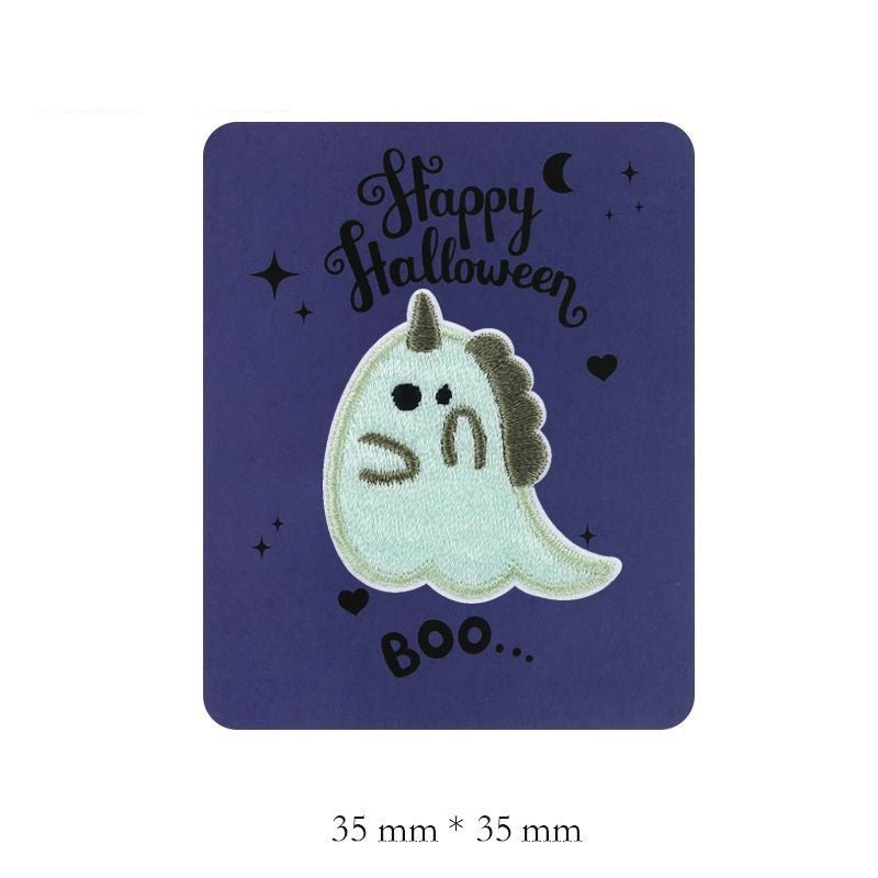 Light green embroidered ghost patch with pointed top and stitched face
